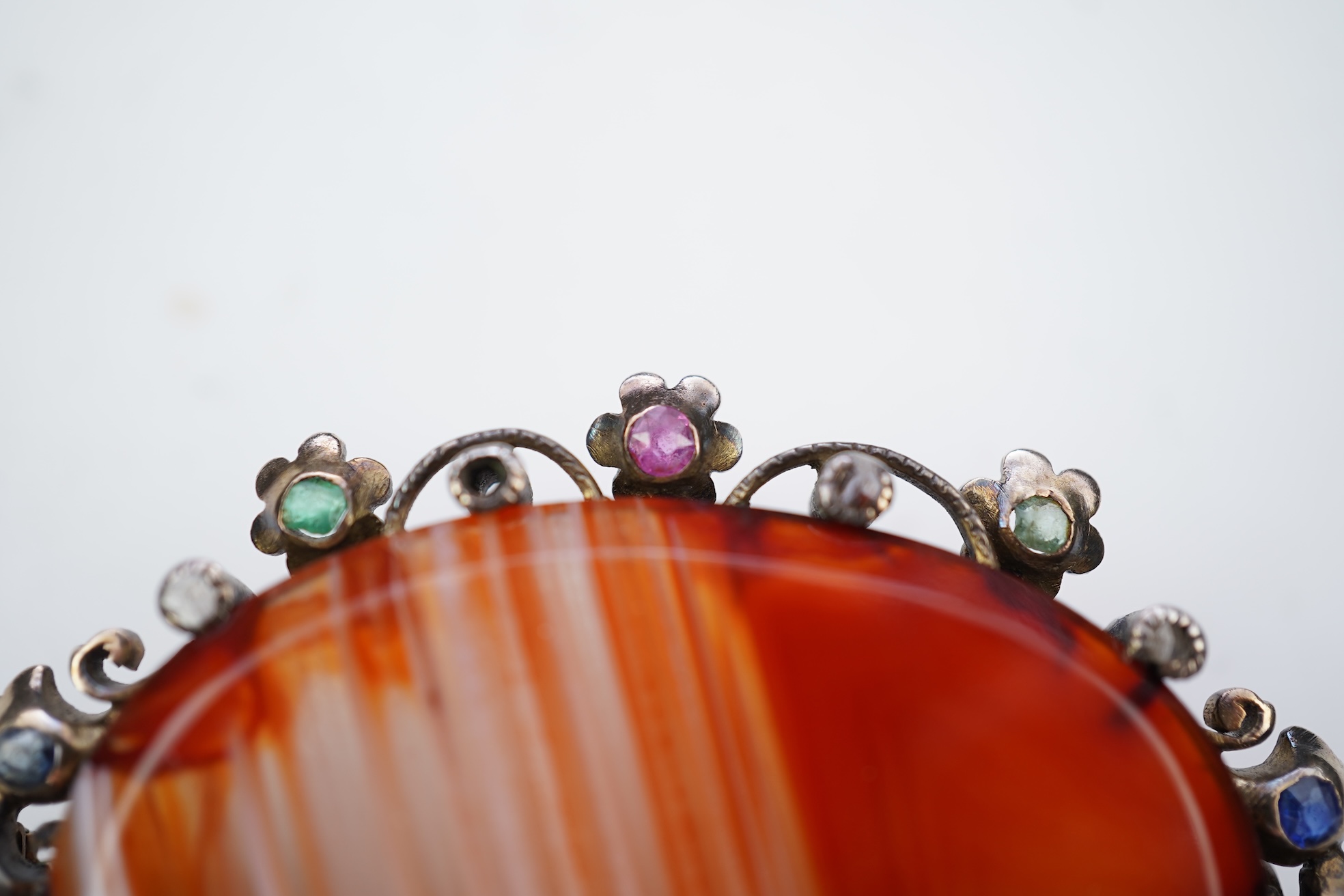 An agate, ruby, emerald and diamond brooch, circa 1900